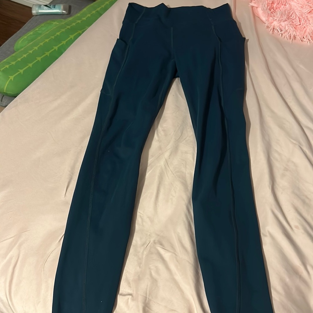 teal fabletics leggings. size small.
